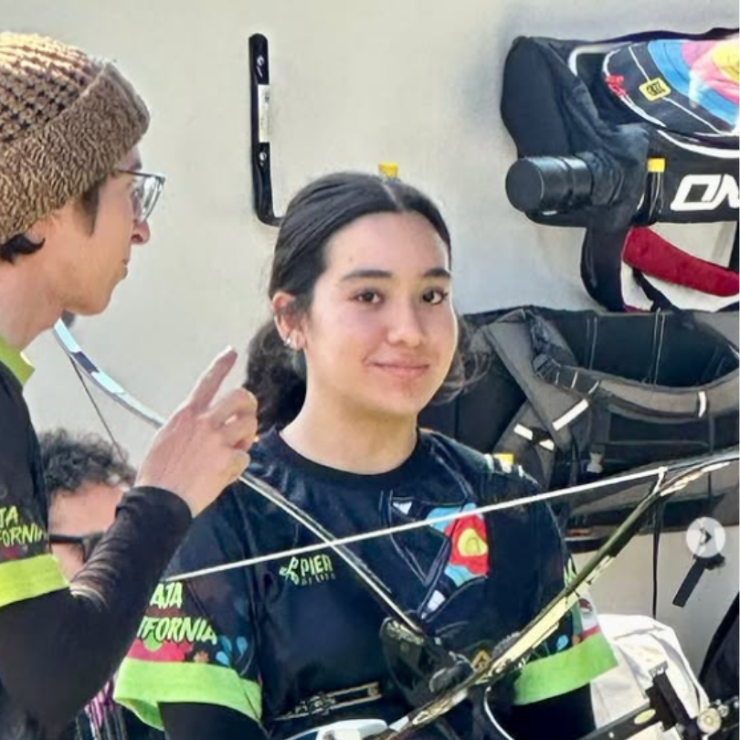 Elisa with archery equipment
